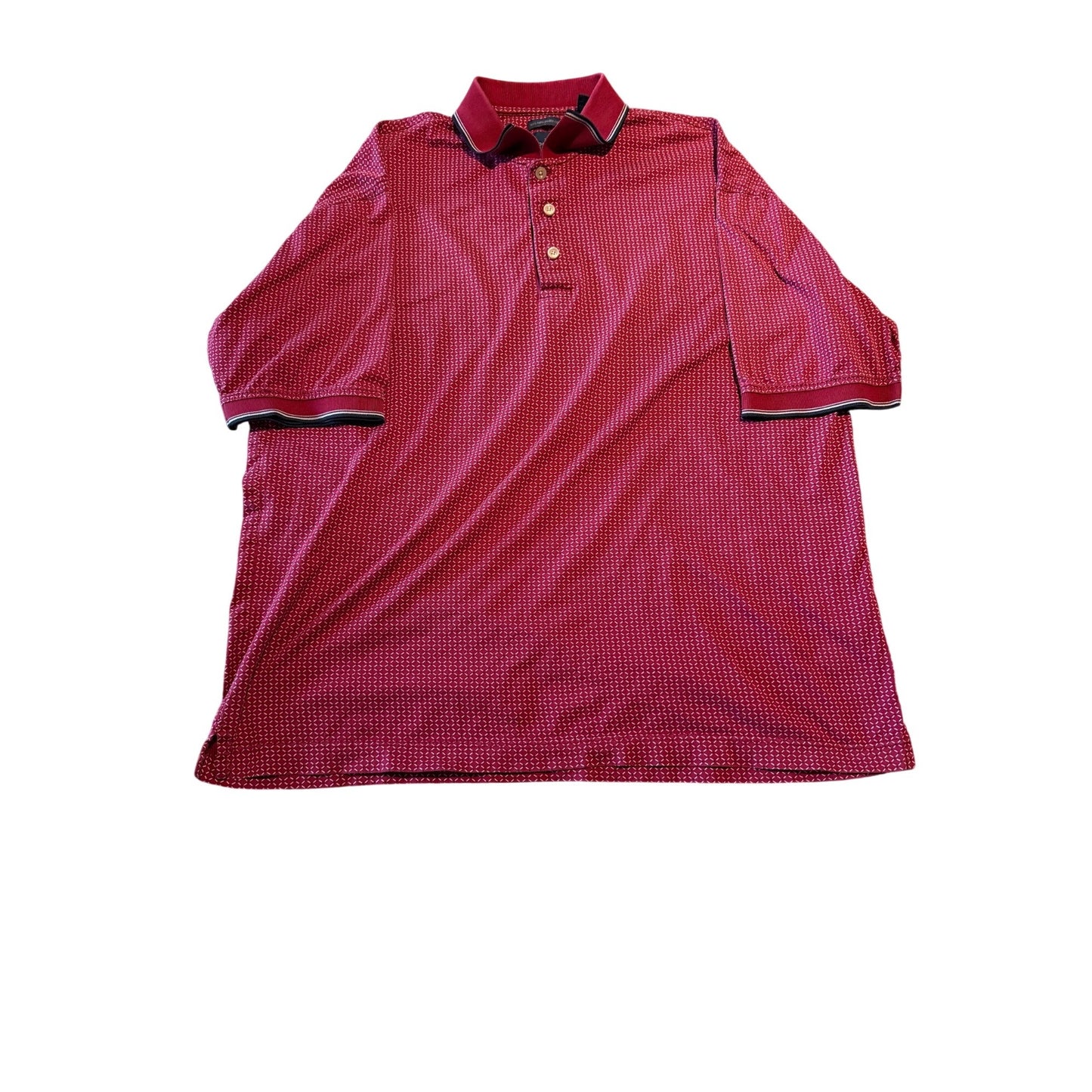 A short-sleeve polo shirt in a textured red and black micro-check pattern, featuring a two-button placket and contrasting dark trim on the collar and sleeve cuffs, laid flat against a white background.