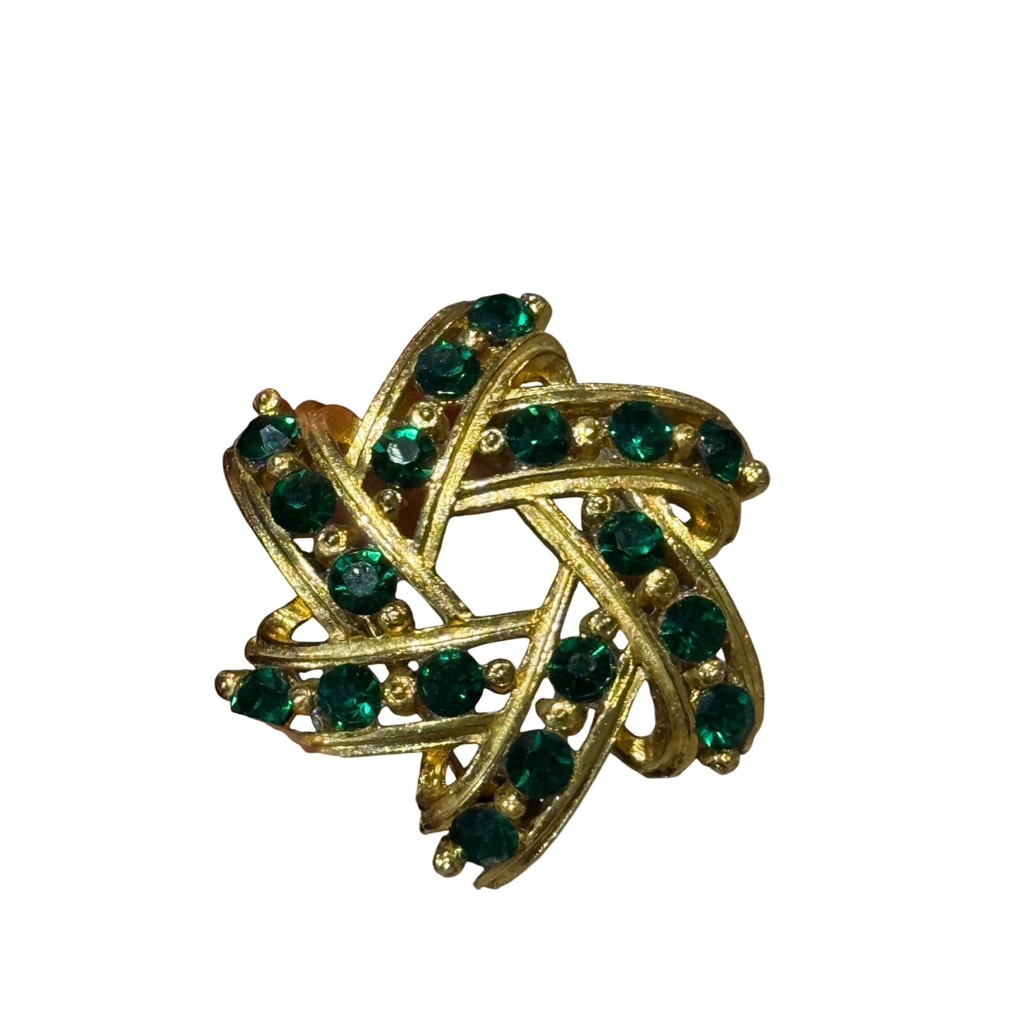 A gold-toned interwoven star-shaped brooch or pin embellished with multiple round green rhinestones, shown on a plain white background.