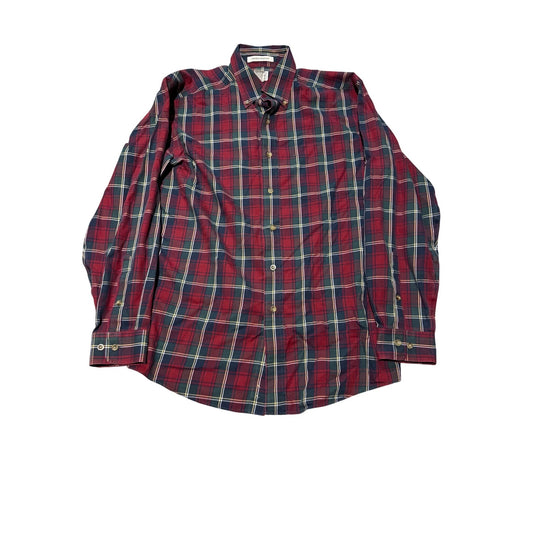 A long-sleeve plaid button-down shirt in red, navy, and white, laid flat against a white background.