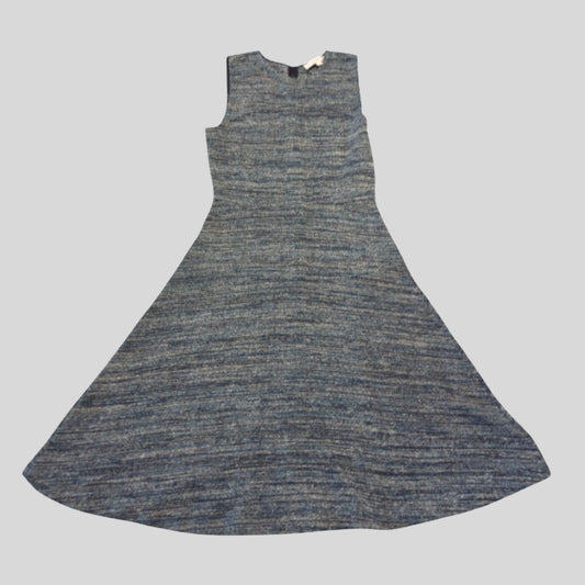 A sleeveless A-line dress with a textured, heathered blue and gray knit fabric, shown flat against a solid gray background.