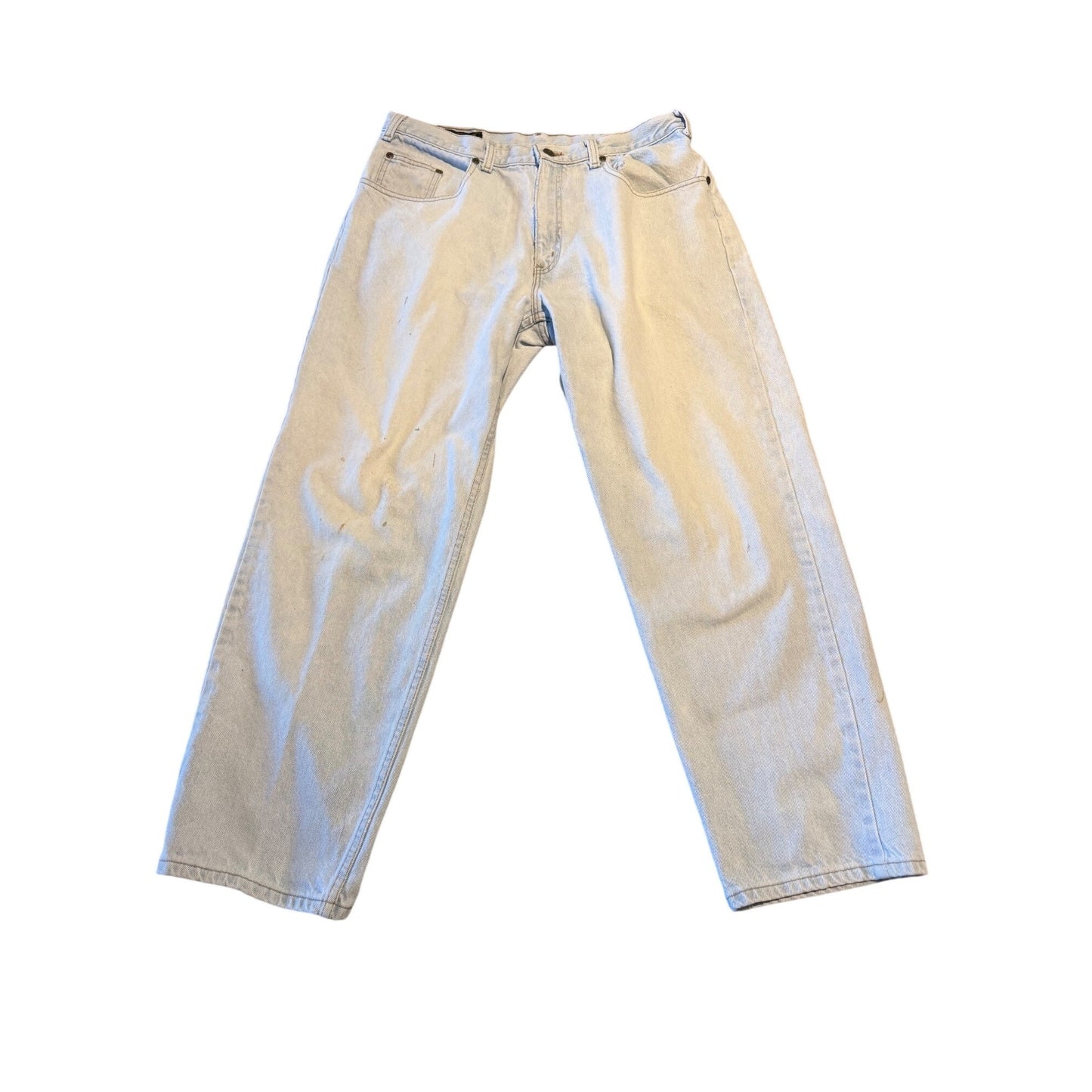 A pair of light-wash blue denim jeans laid flat against a white background.