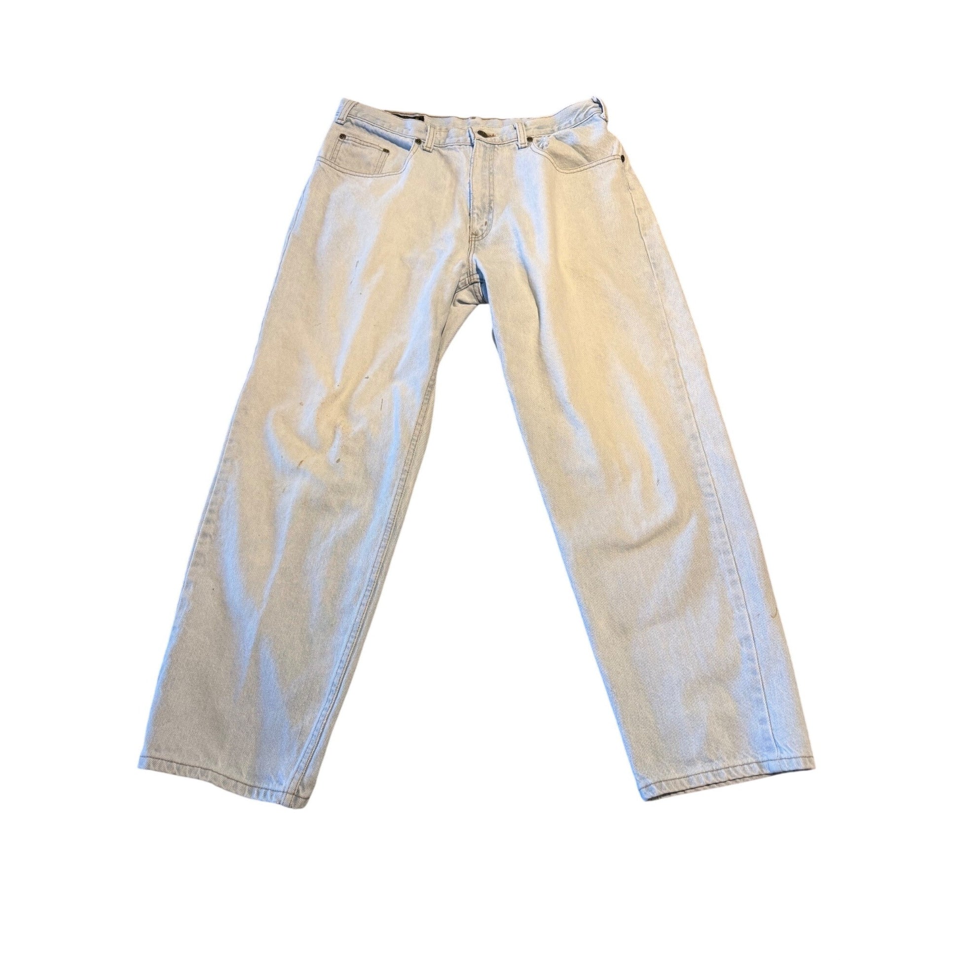 A pair of light-wash blue denim jeans laid flat against a white background.